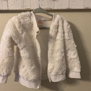 What furry light weight jacket. 18 months.